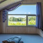 4 Personen Mit Kaminofen, Kanu Und Herrlichem Seeblick In Otterndorf