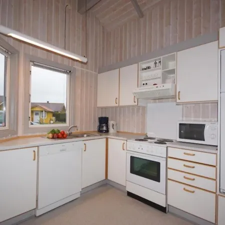 4 Personen Mit Kaminofen, Kanu Und Herrlichem Seeblick In Ferienhaus Otterndorf