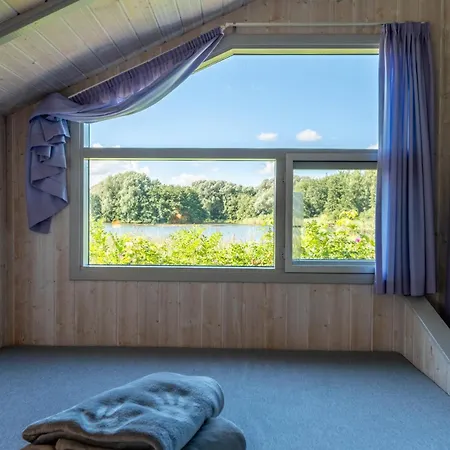 4 Personen Mit Kaminofen, Kanu Und Herrlichem Seeblick In Otterndorf