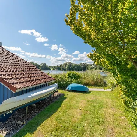 4 Personen Mit Kaminofen, Kanu Und Herrlichem Seeblick In Otterndorf